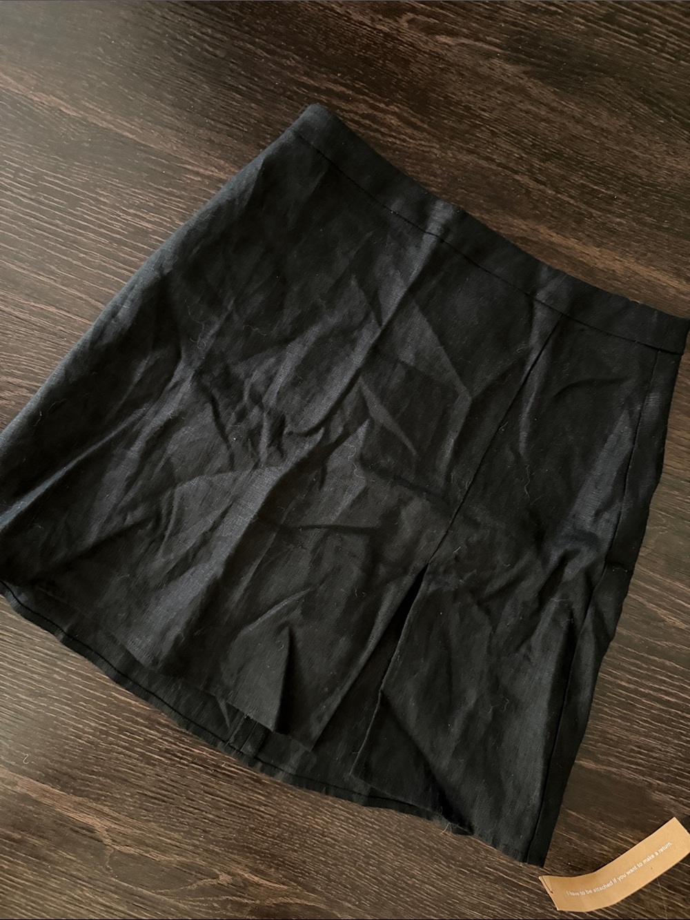 Reformation Black Mini Skirt with Subtle Hem Pleats